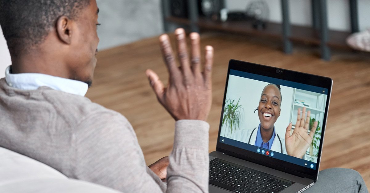 Patient on their laptop for a TeleHealth appointment.