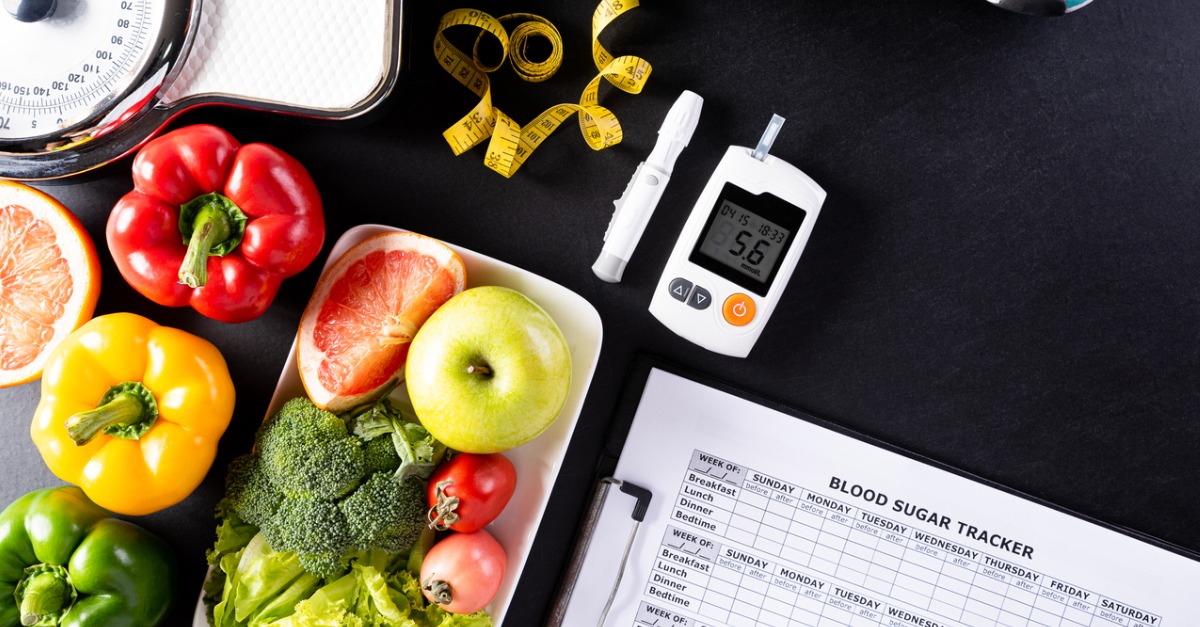 World Diabetes Day, glucometer with fresh vegetables