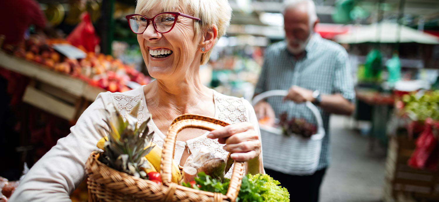 Senior shopping for healthy fruits and vegetables.