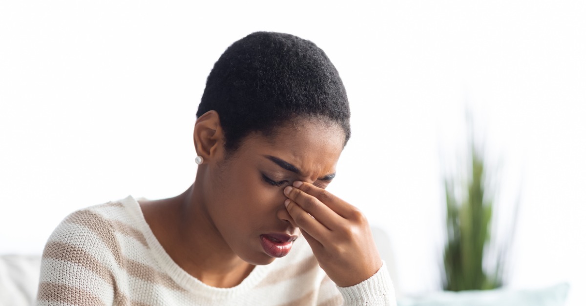 https://www.yourtownhealth.com/wp-content/uploads/2022/09/sinusitis-concept-sick-young-black-woman-touching-her-nose-bridge-at-picture-.jpg